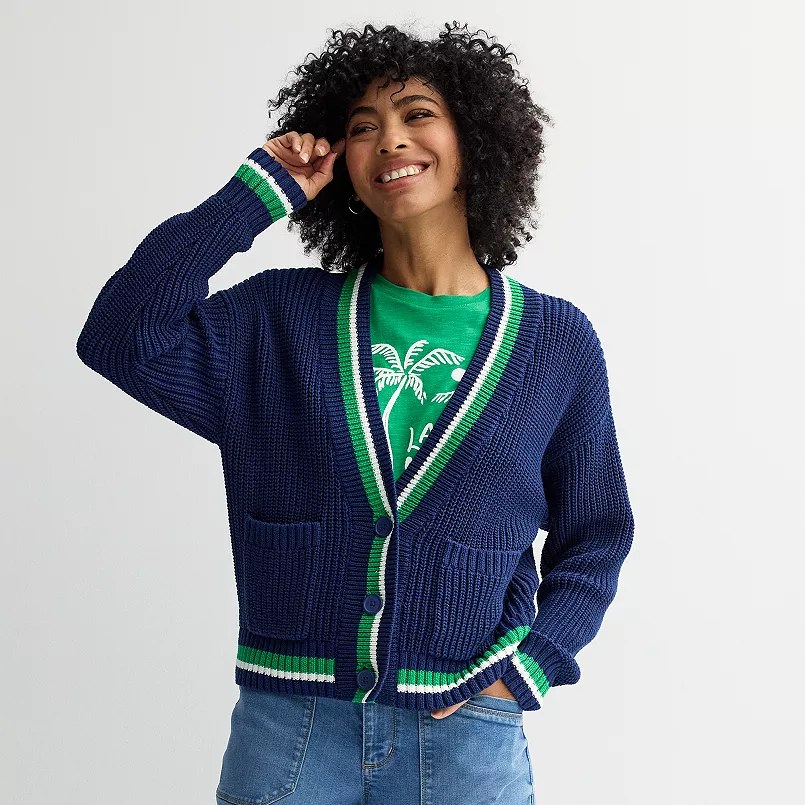 Flat lay of Sonoma Goods for Life products including a plush bath rug, a cozy hoodie sweatshirt, and casual capri pants arranged on a warm neutral background